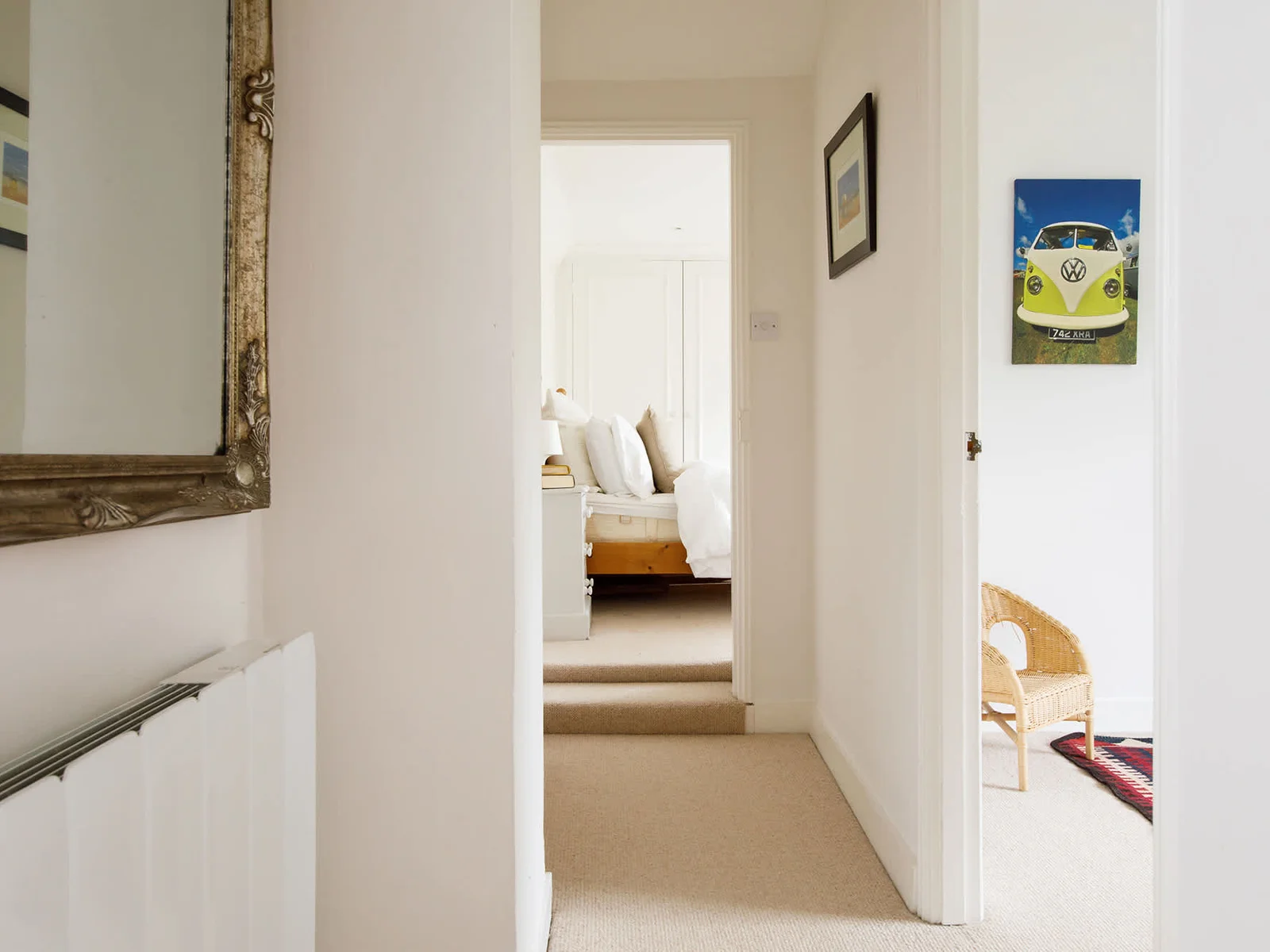 Snug carpeted floors cover the entire top floor