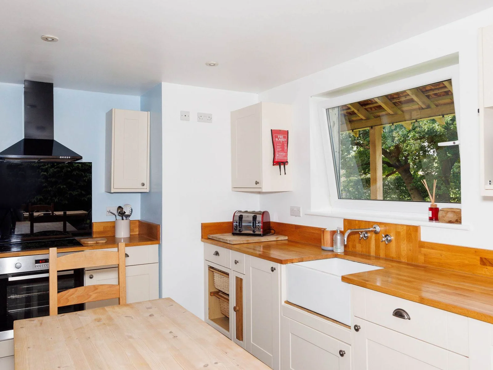 Enjoy looking out to countryside surroundings while cooking for friends and family.