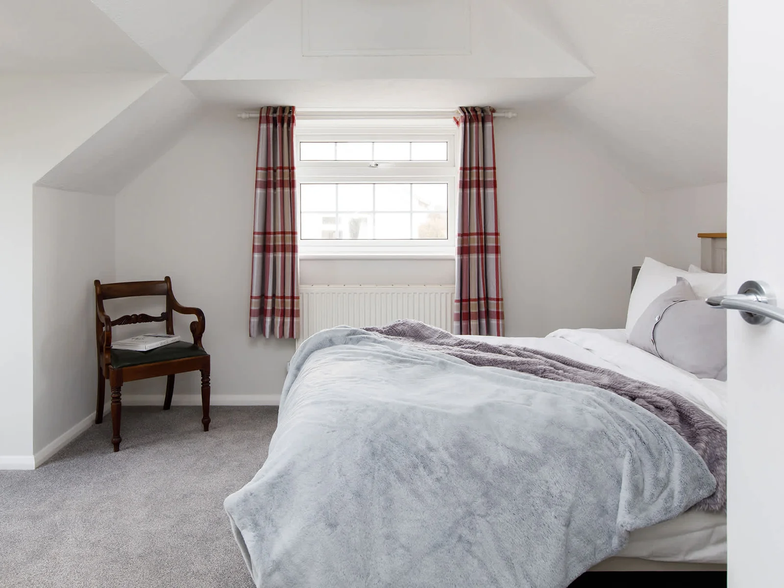 The second upstairs king room is light and spacious.