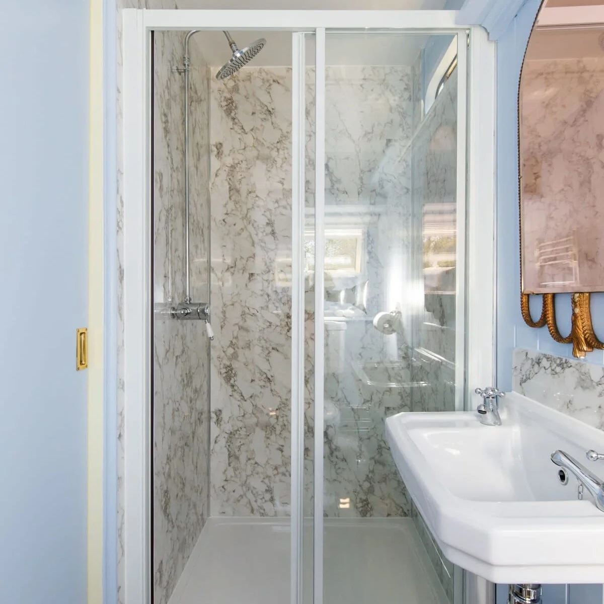Rinse off after the beach before heading out to the patio for a cold drink.