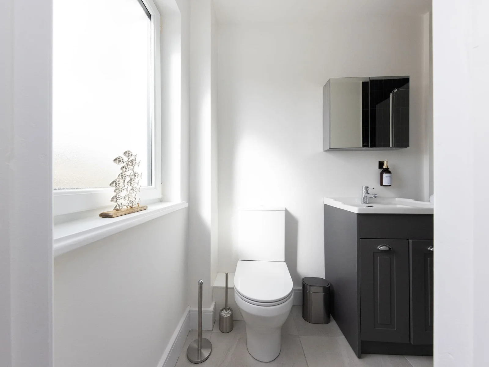 Your private en-suite, a bright and modern personal bathroom space.