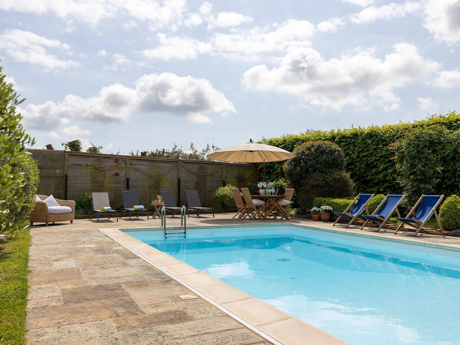 Sunny poolside space perfect for relaxed outdoor living.