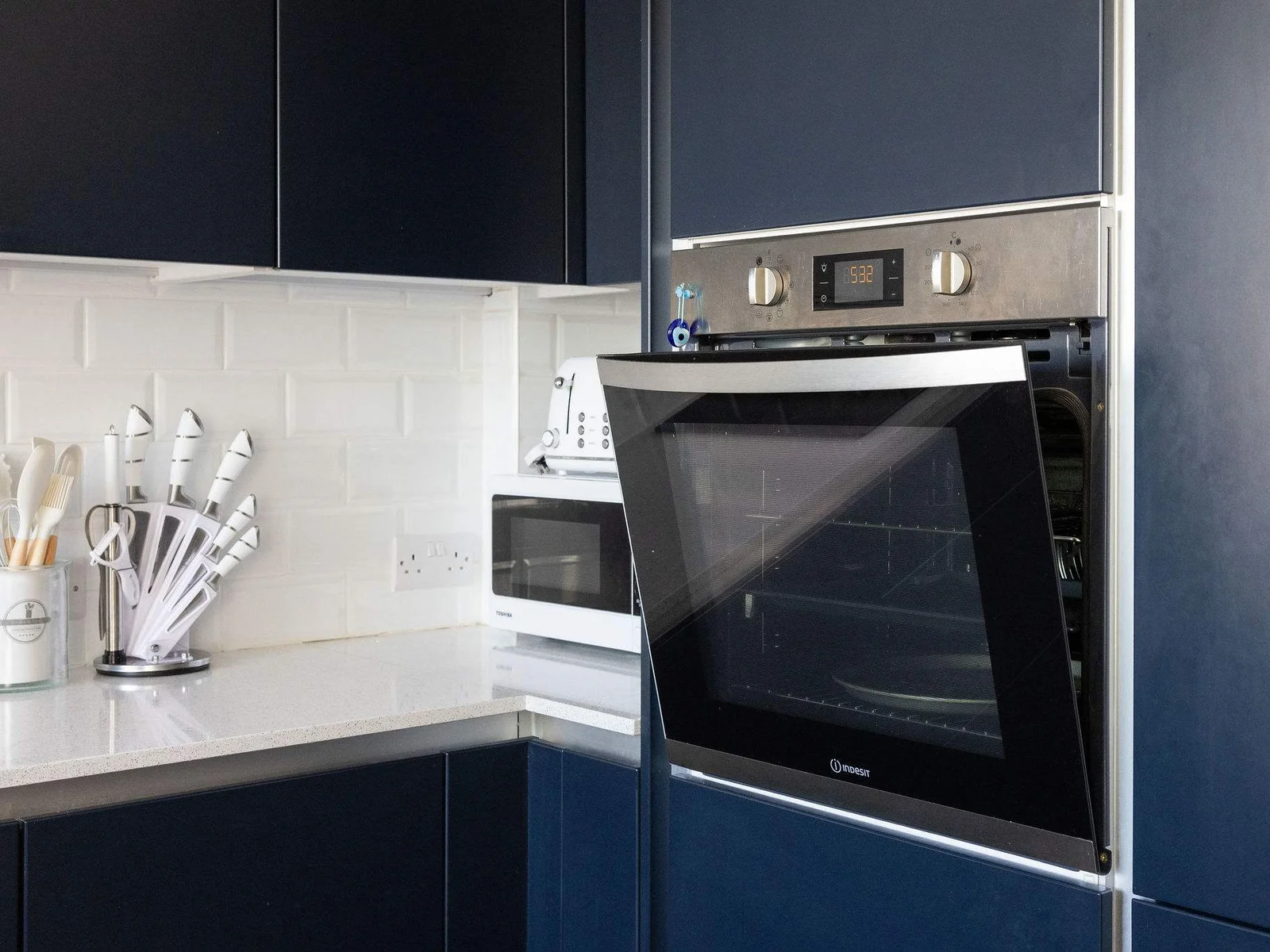 Fully equipped with oven, toaster, and microwave