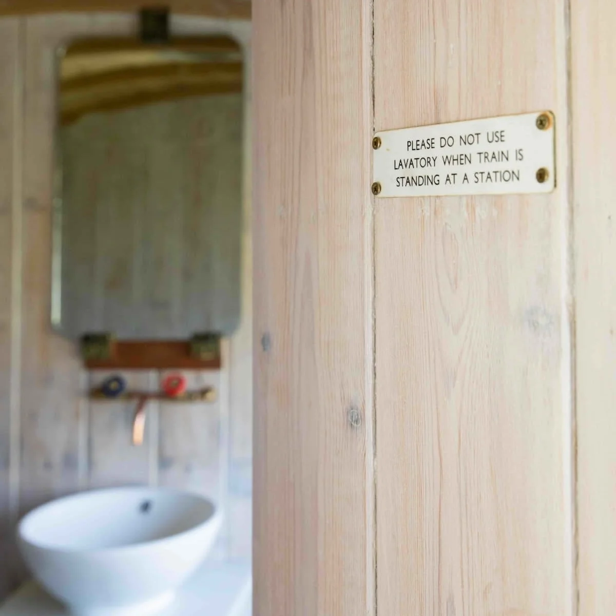 Fun signs remind you that where you're staying was once a train!