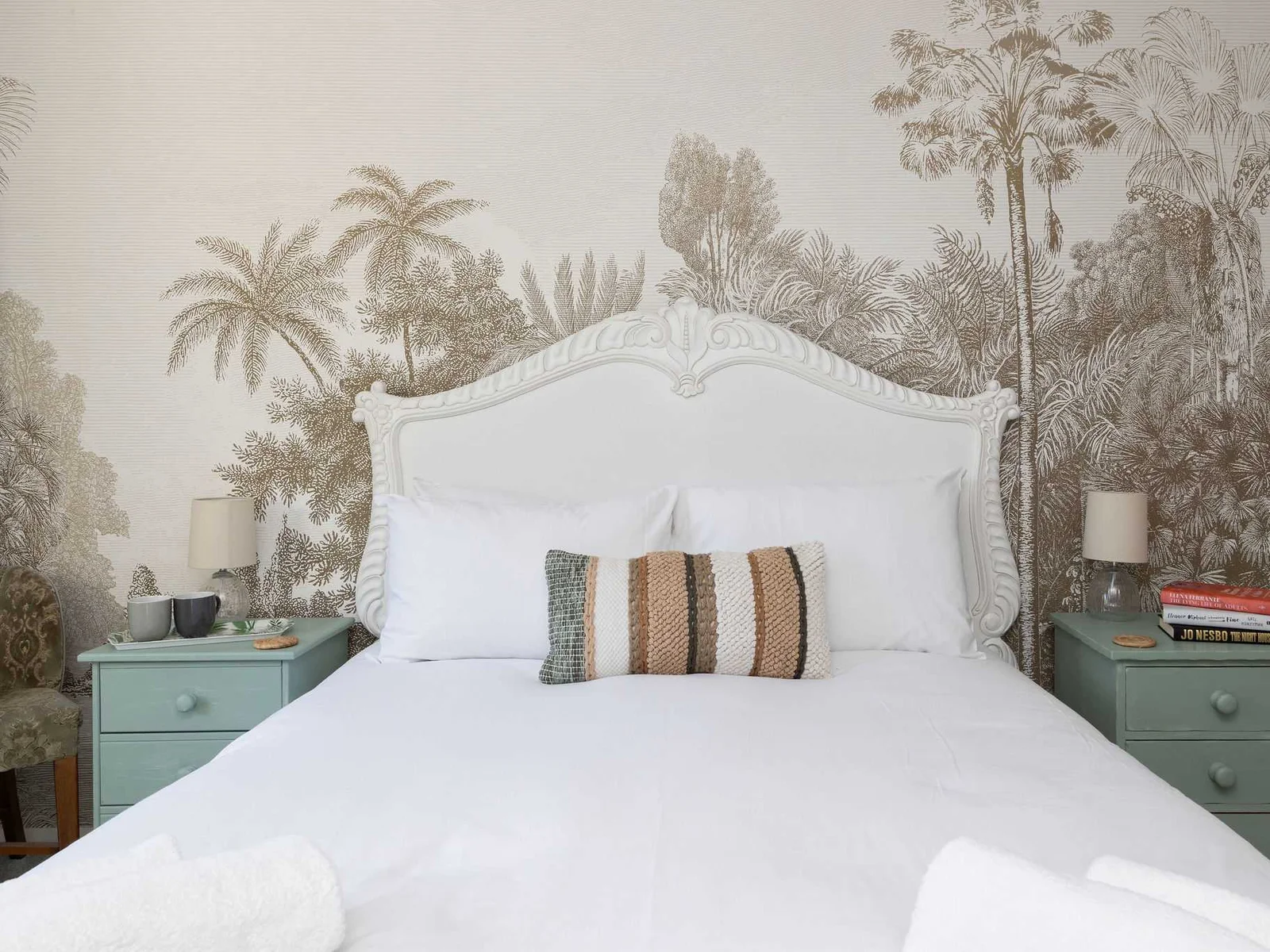 The king bedroom offers a calm, stylish setting designed for comfort and restful nights.