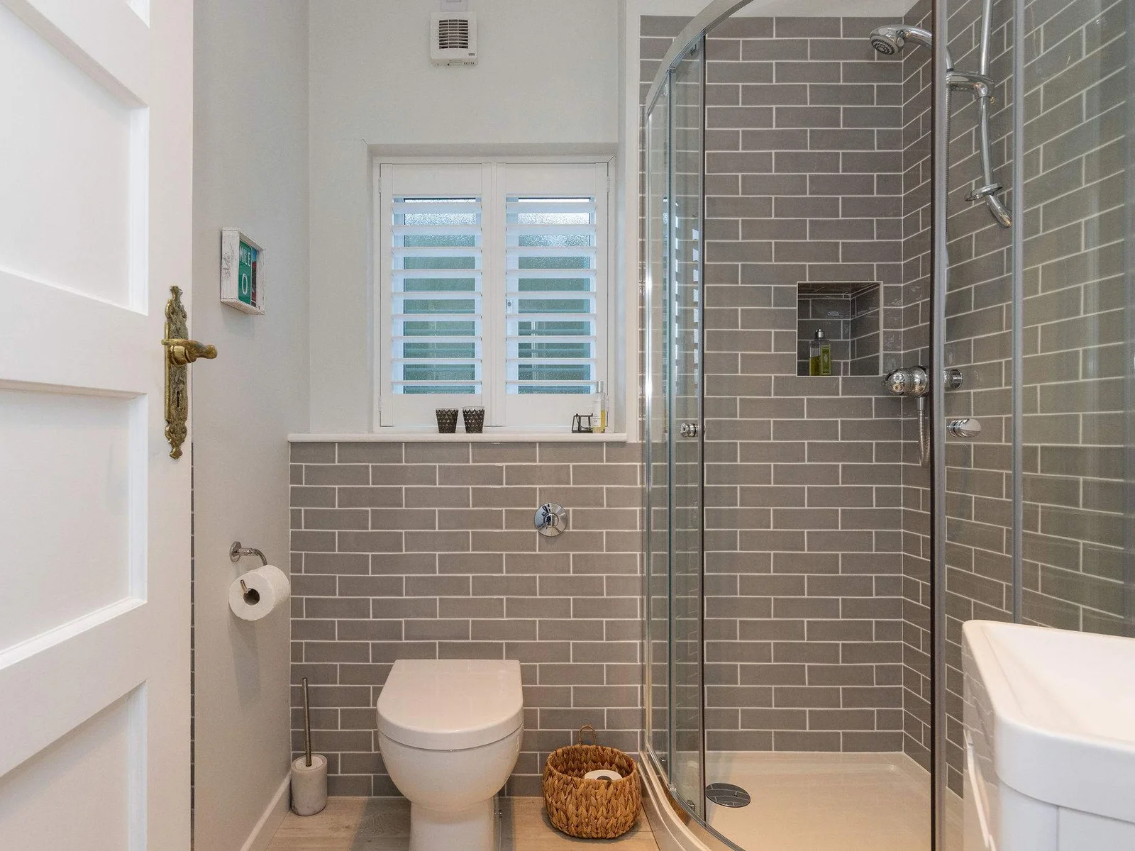Modern bathroom with walk-in shower.