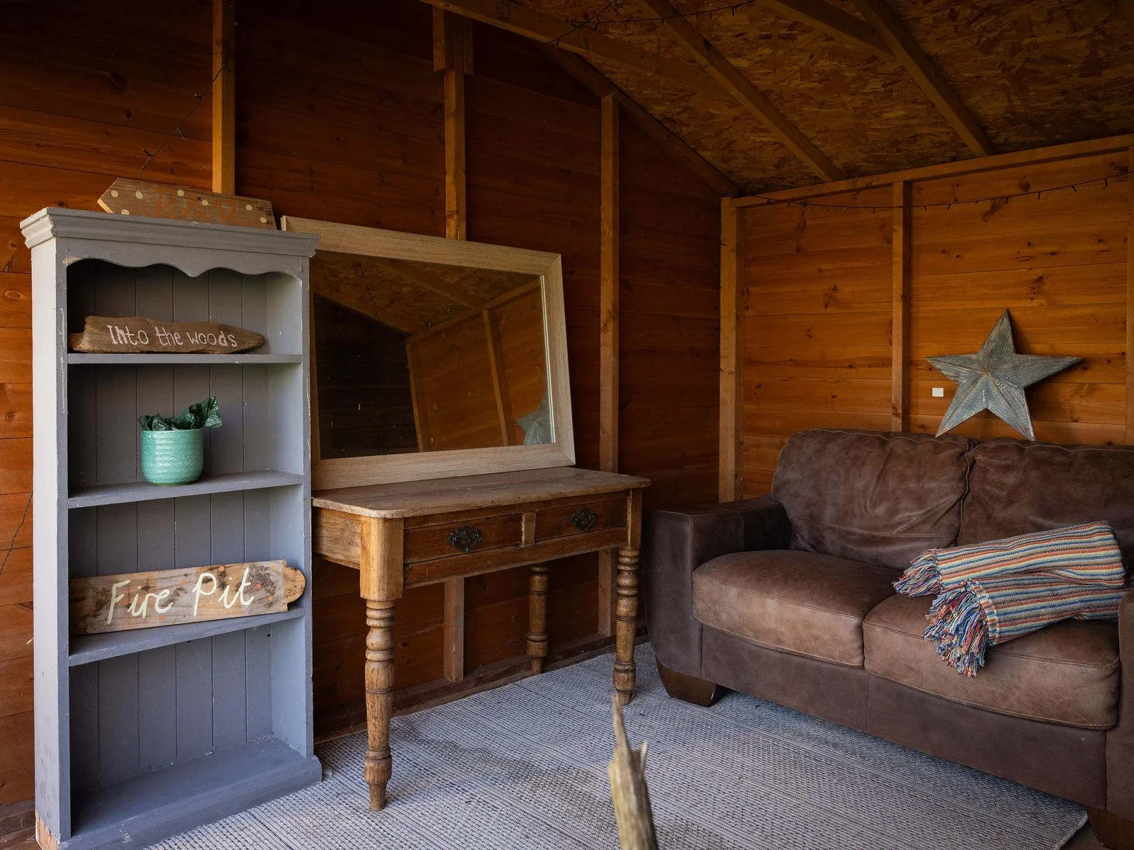 A small summer house with inside seating