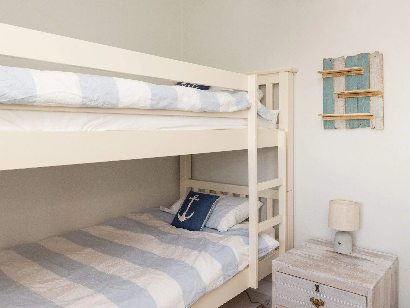 Fun coastal bunk room perfect for children.