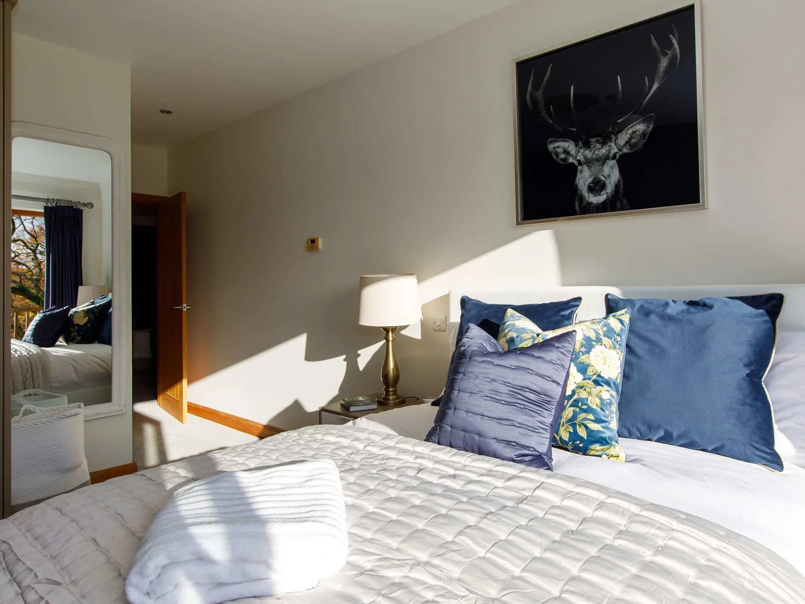 Luxury bedding and throws make a cosy night's sleep.
