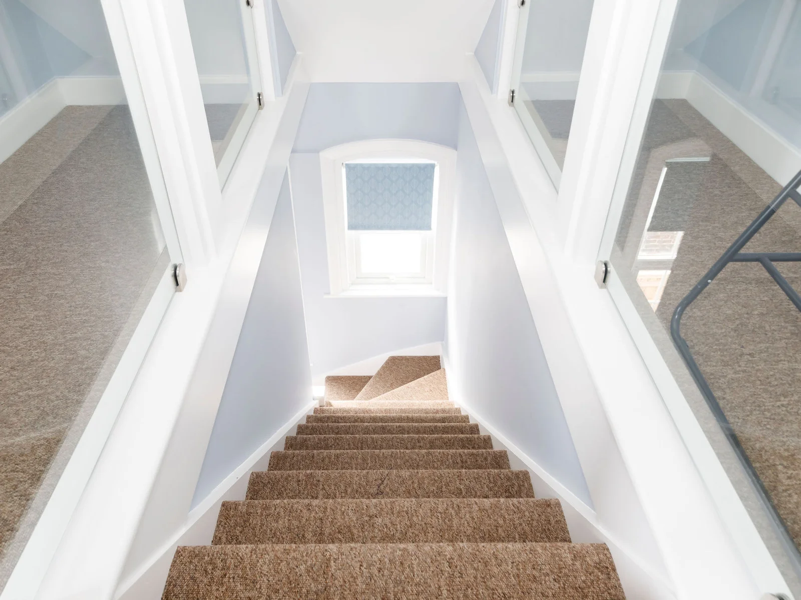 Stairs up to the master bedroom