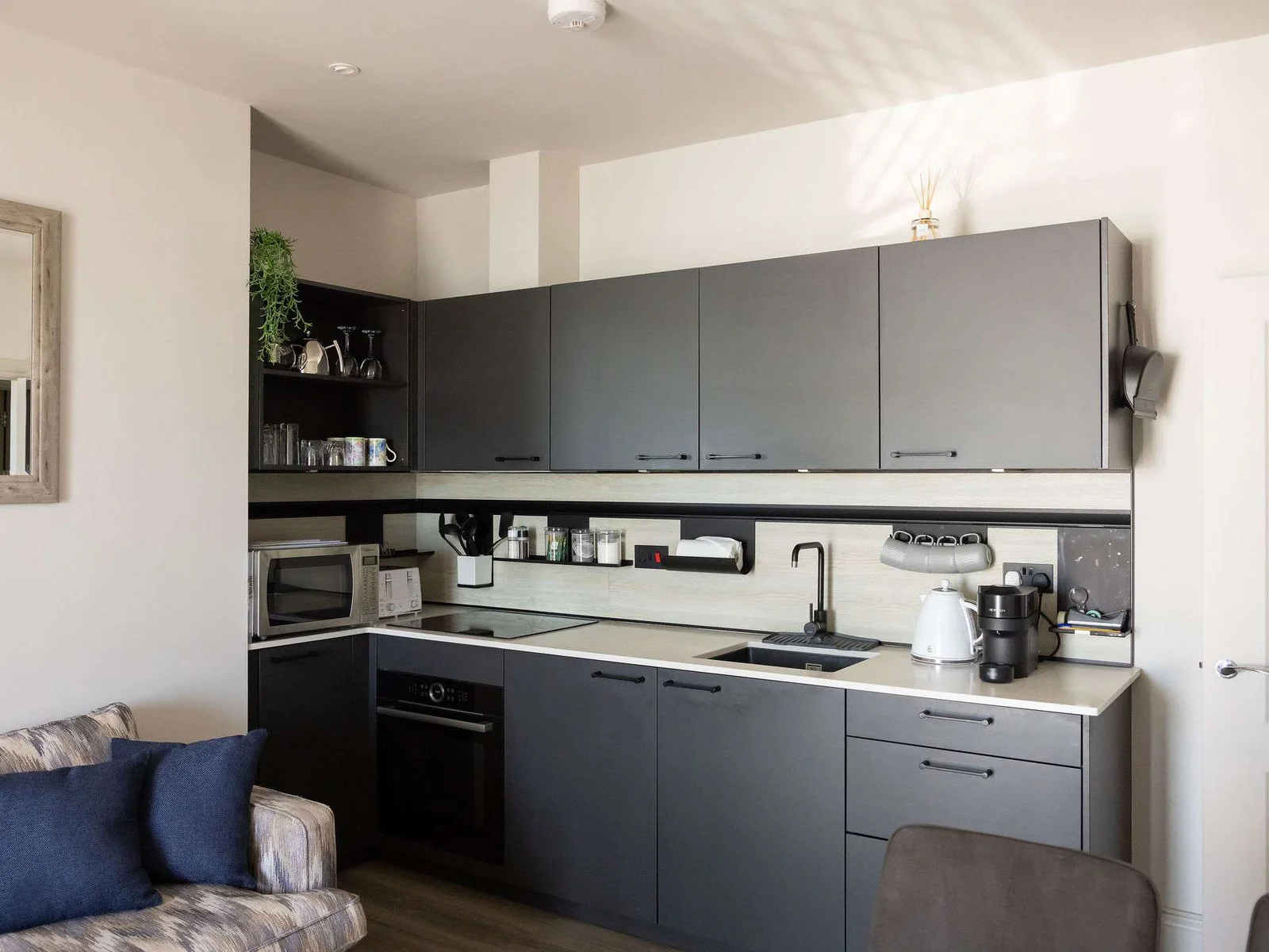 A modern, well-equipped kitchen makes relaxed coastal stays easy and enjoyable.