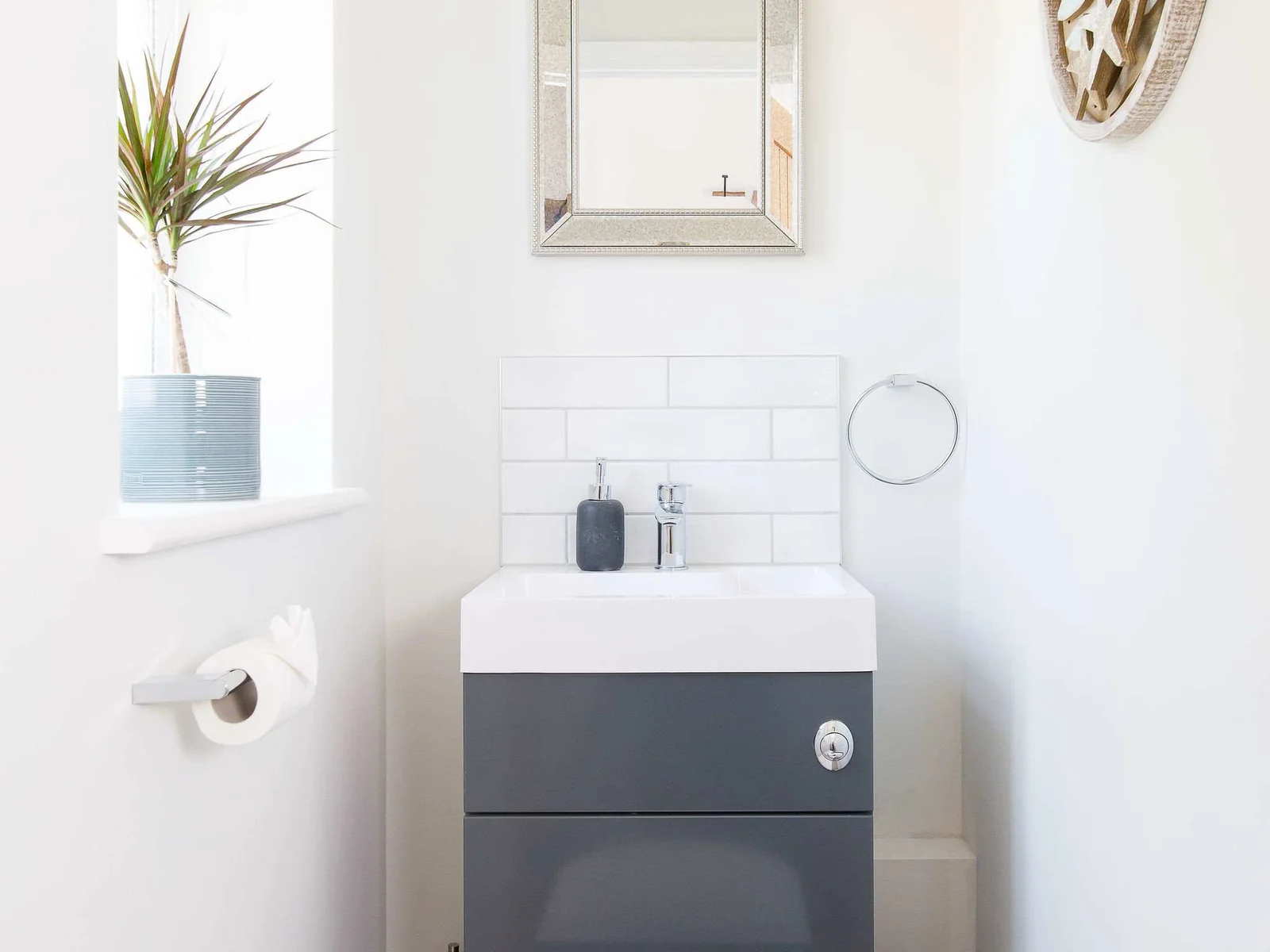 Downstairs cloakroom with WC and sink.