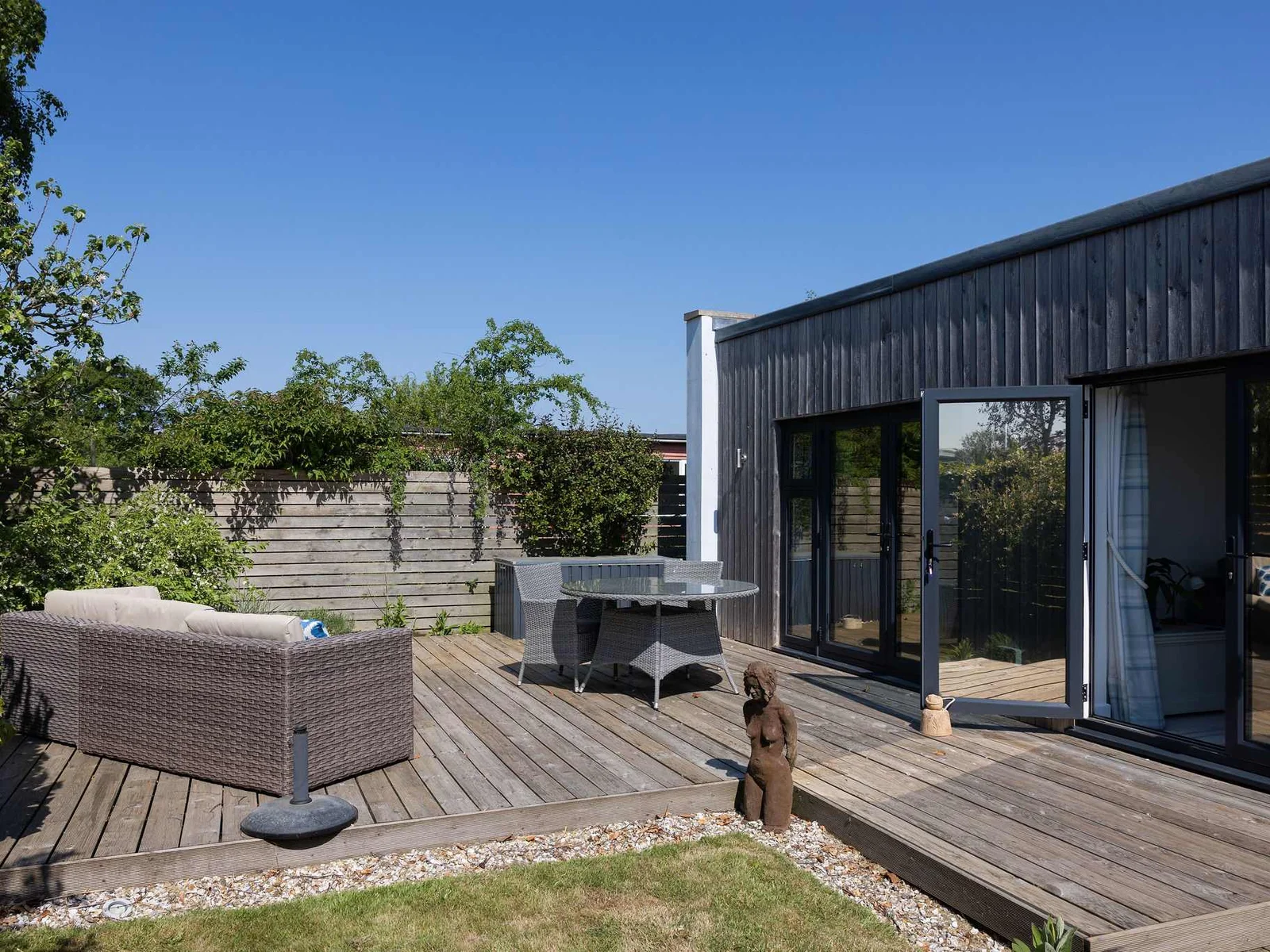 Unwind in style on this beautiful outdoor patio, perfect for morning coffee or evening gatherings.