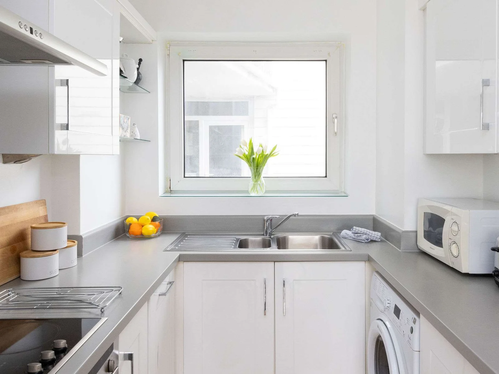 Light-filled kitchen with window views, modern appliances, and everything you need for relaxed holiday dining.