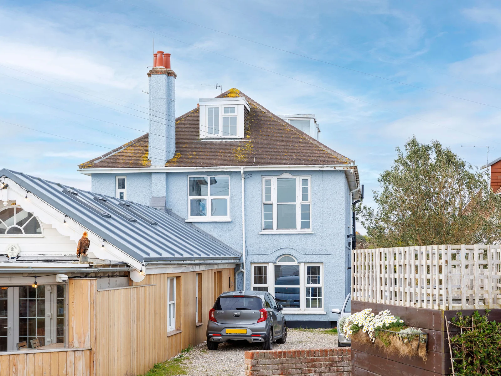 The apartment is located just above and behind the famous lobster pot restaurant