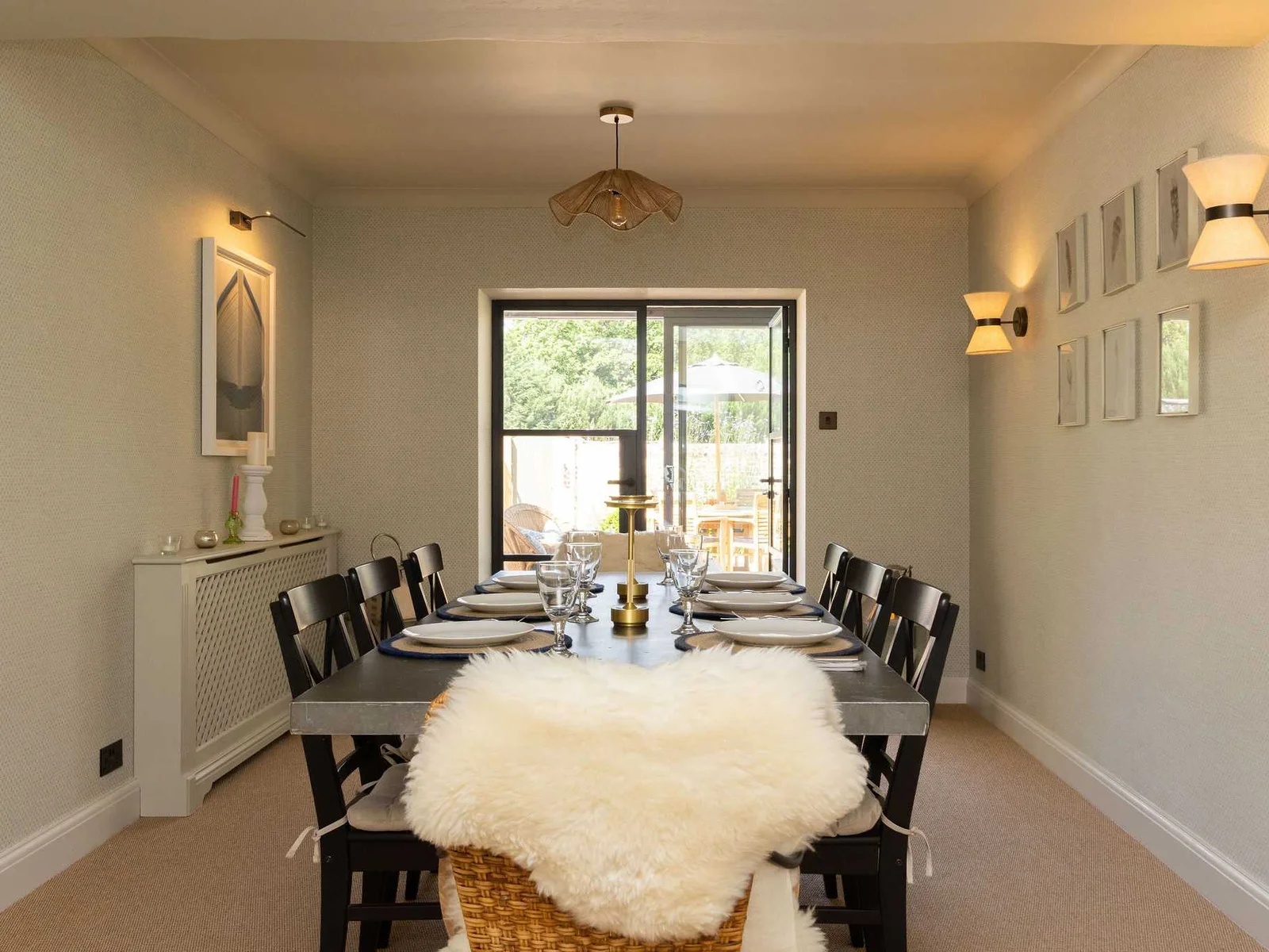 Stylish dining space featuring a generous table and garden outlook for relaxed holiday meals