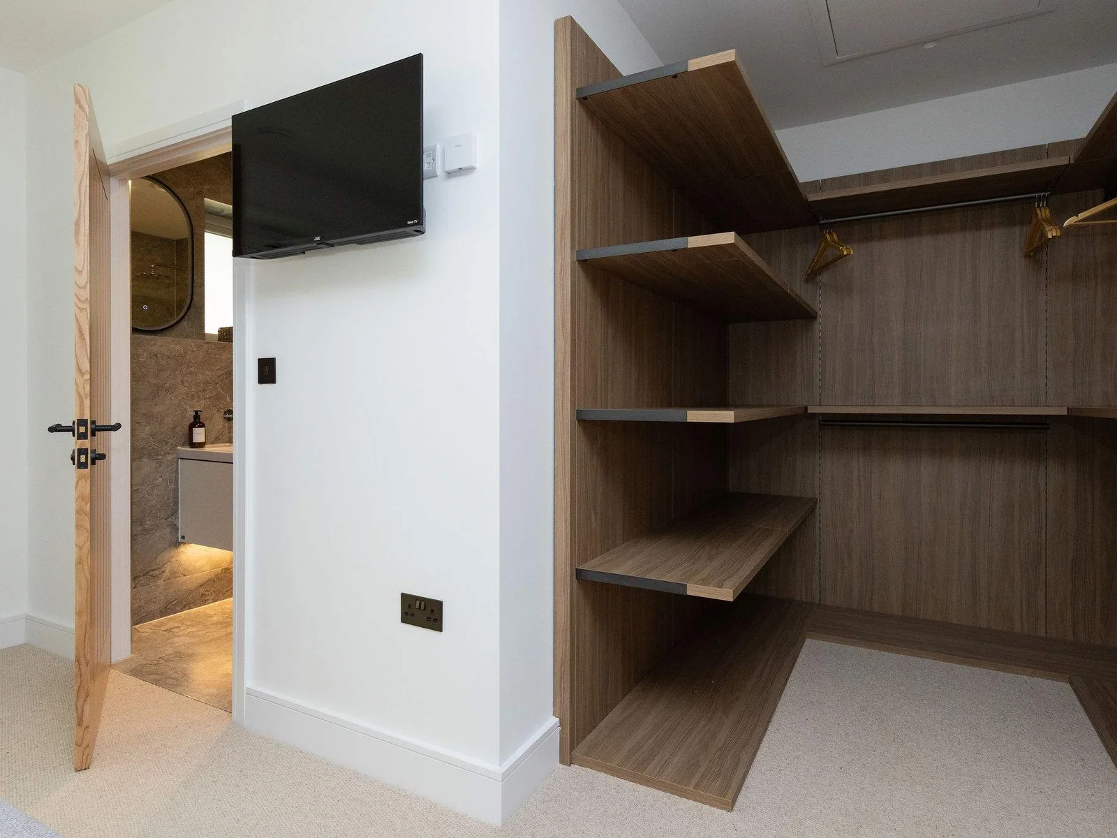 Spacious fitted wardrobe with ample storage space