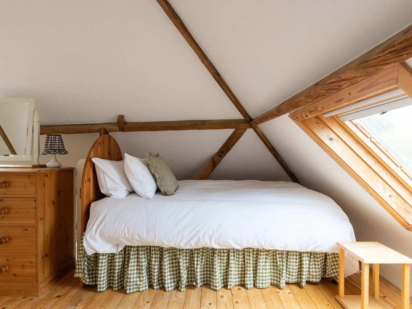 Cosy single bed in the mezzanine twin room, with skylight views of the surrounding countryside.