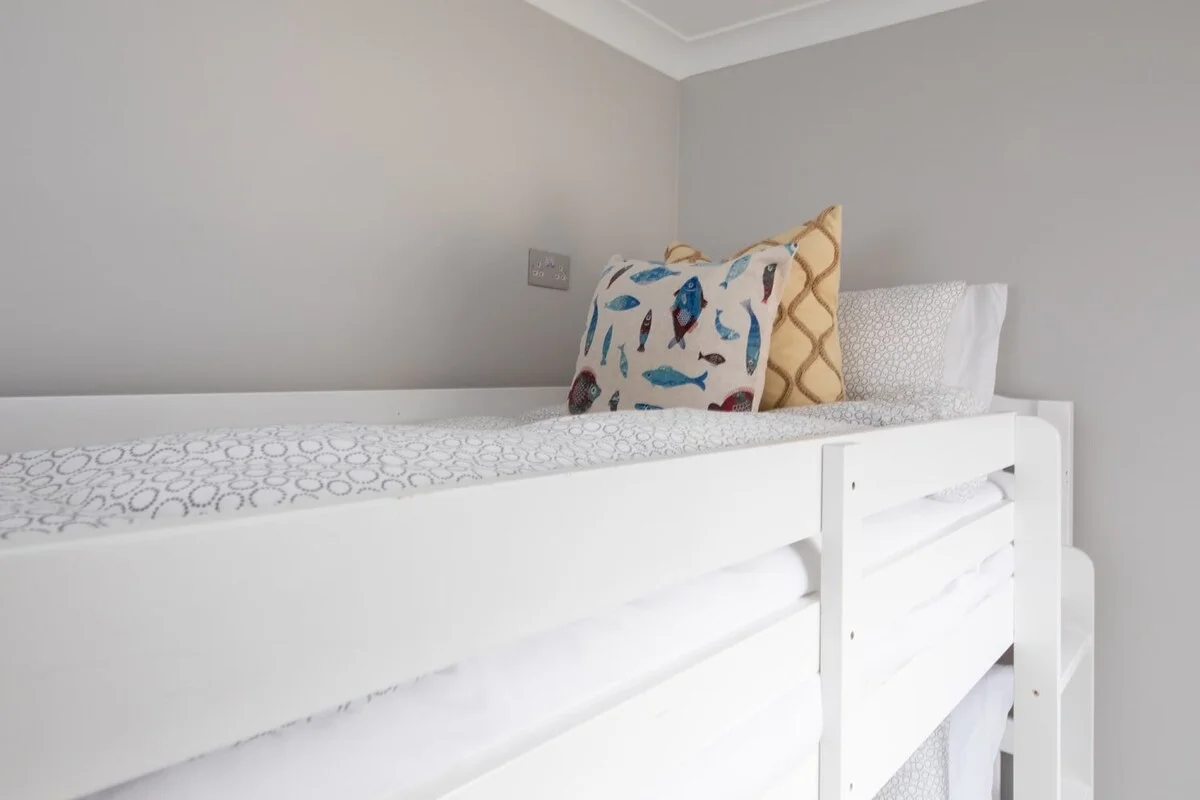 Who is going to occupy the top bunk bed?