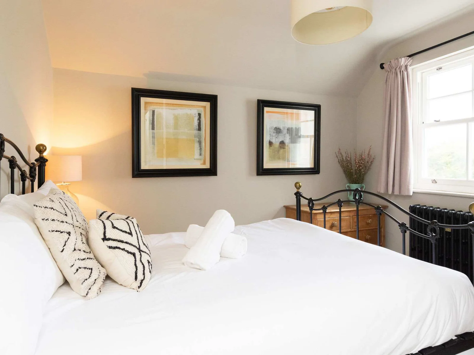 A stylish and comfortable double bedroom, offering a peaceful retreat after a day's adventures.