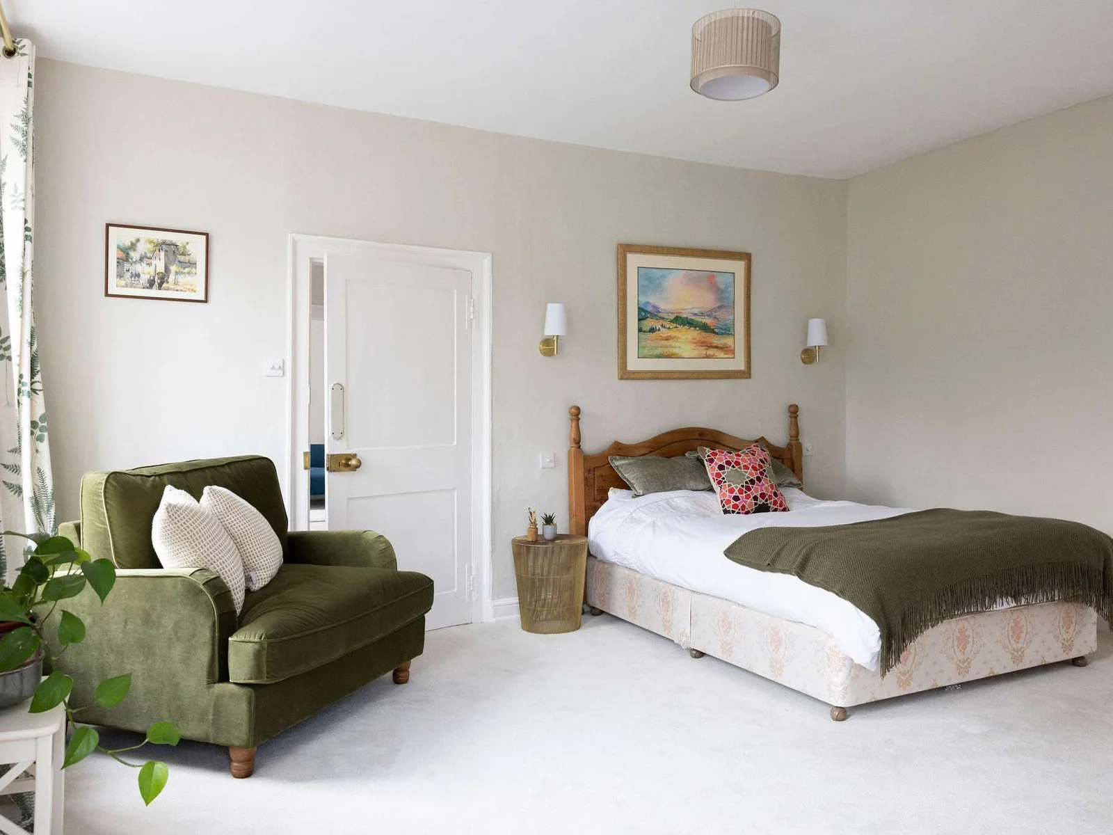 Relaxing super king suite with a plush sofa bed and peaceful décor