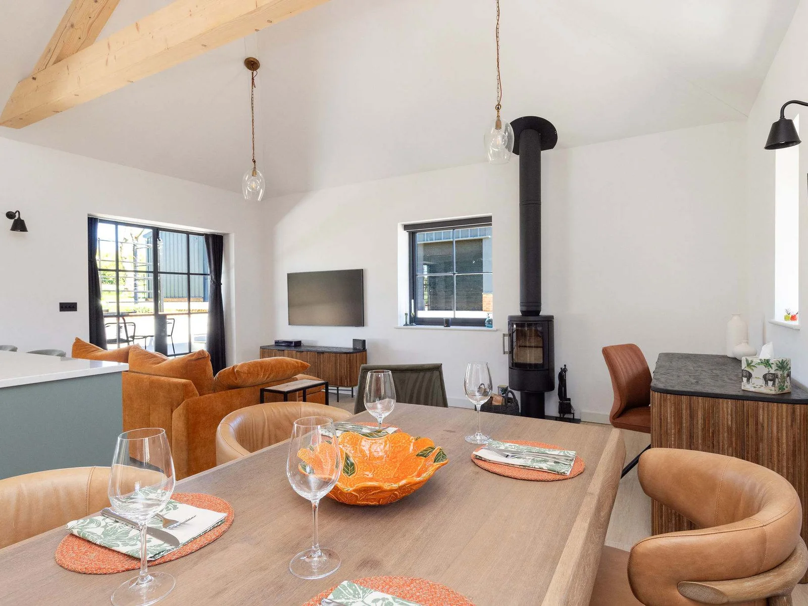 Relax in the bright open-plan lodge, with cosy seating and peaceful Chichester countryside style throughout.