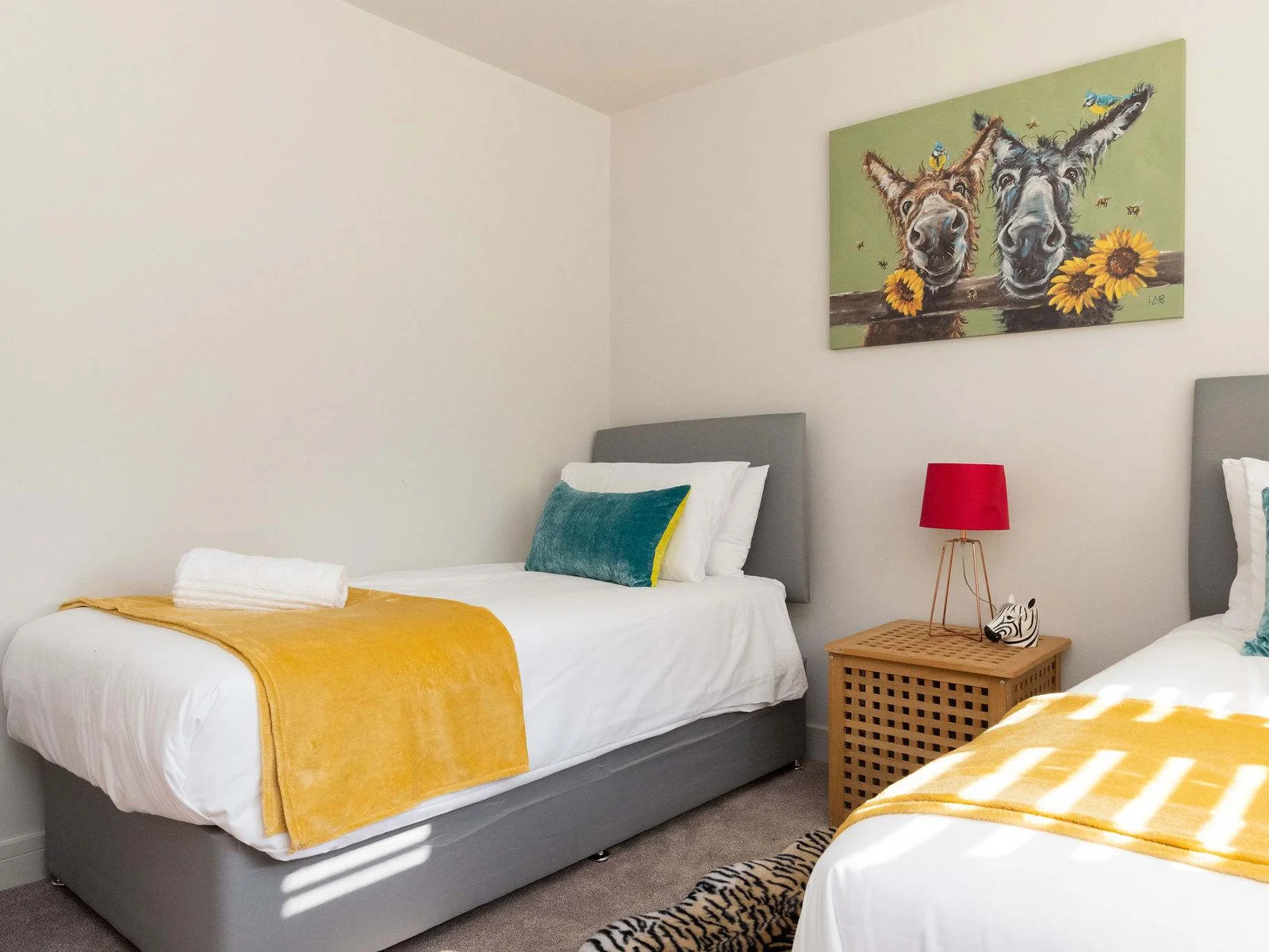 Bright and welcoming interiors with versatile bedrooms, perfect for families or friends sharing by the sea.