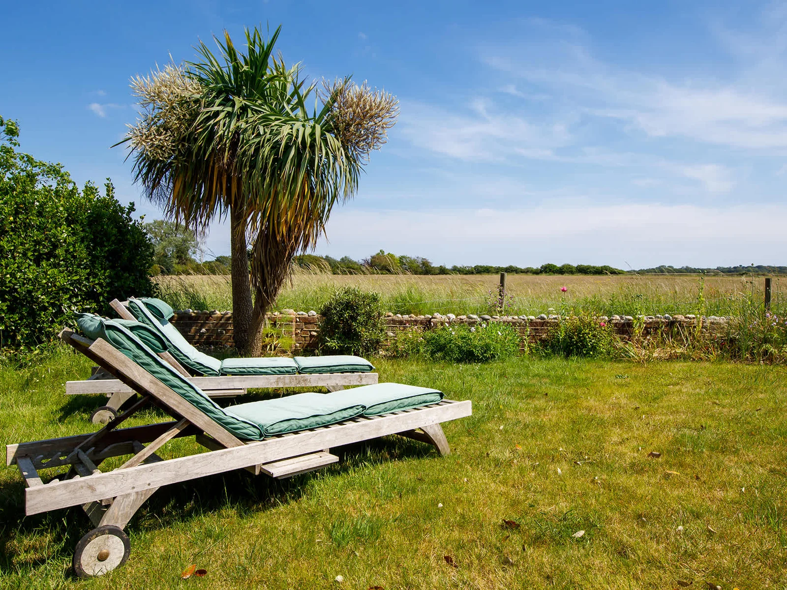 Lounge in the peaceful garden, soaking up the sun