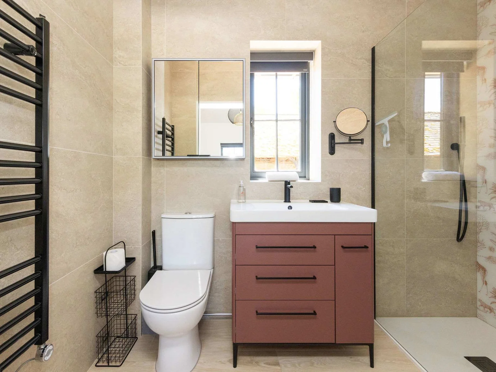 Refresh in a modern bathroom with walk-in shower, earthy tones, and simple Sussex countryside comfort.