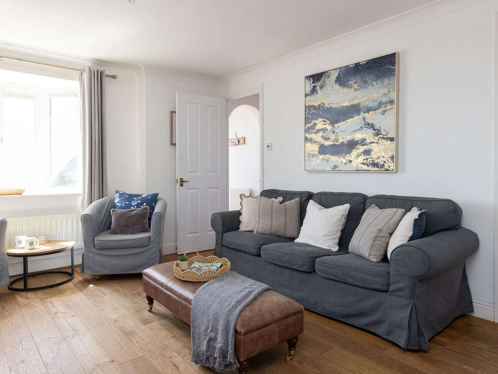 Comfortable lounge with stylish furnishings, perfect for unwinding after a memorable beach day.