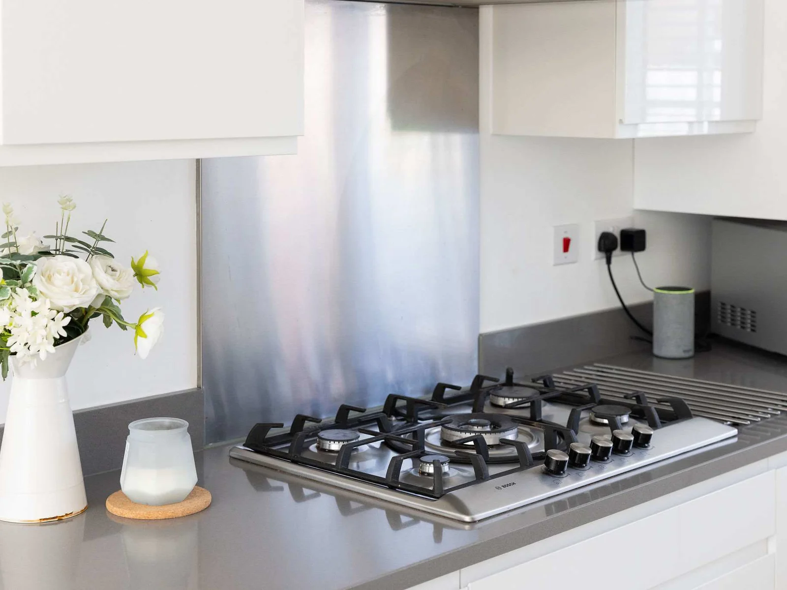 Cook your favourite meals in this sleek and modern kitchen.