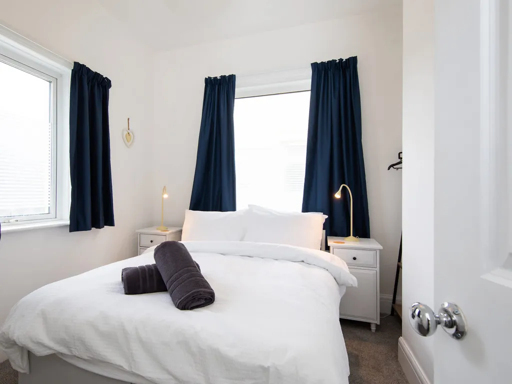 Absolute Beachfront with Decked Garden Oasis and Views