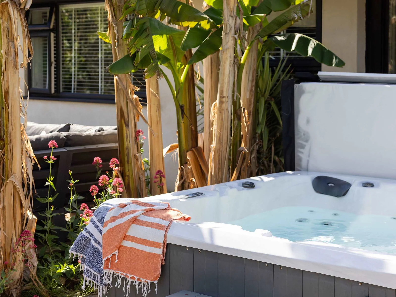 Slip into the hot tub after a day exploring the coast