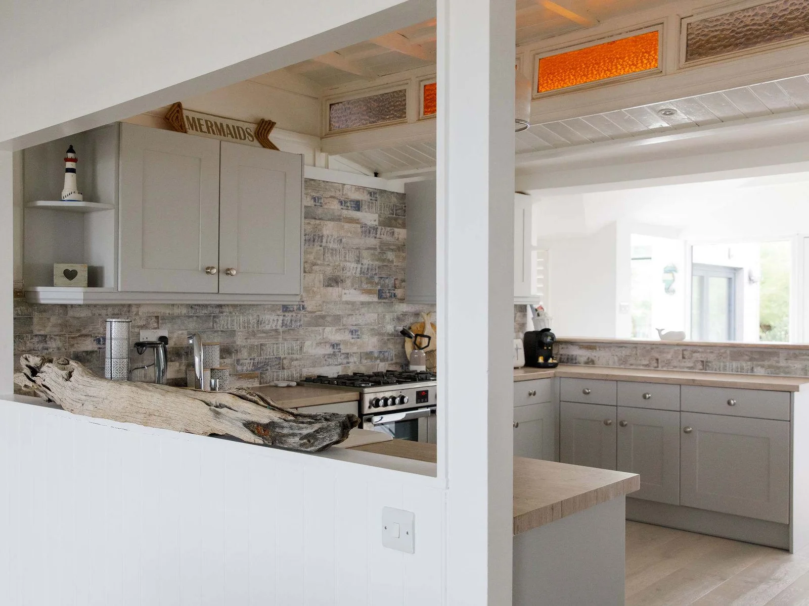 The kitchen is open so you can socialise with friends/family whilst being in there.