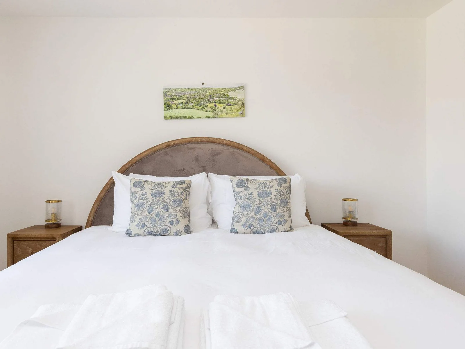 Master bedroom with super king bed and soft linens