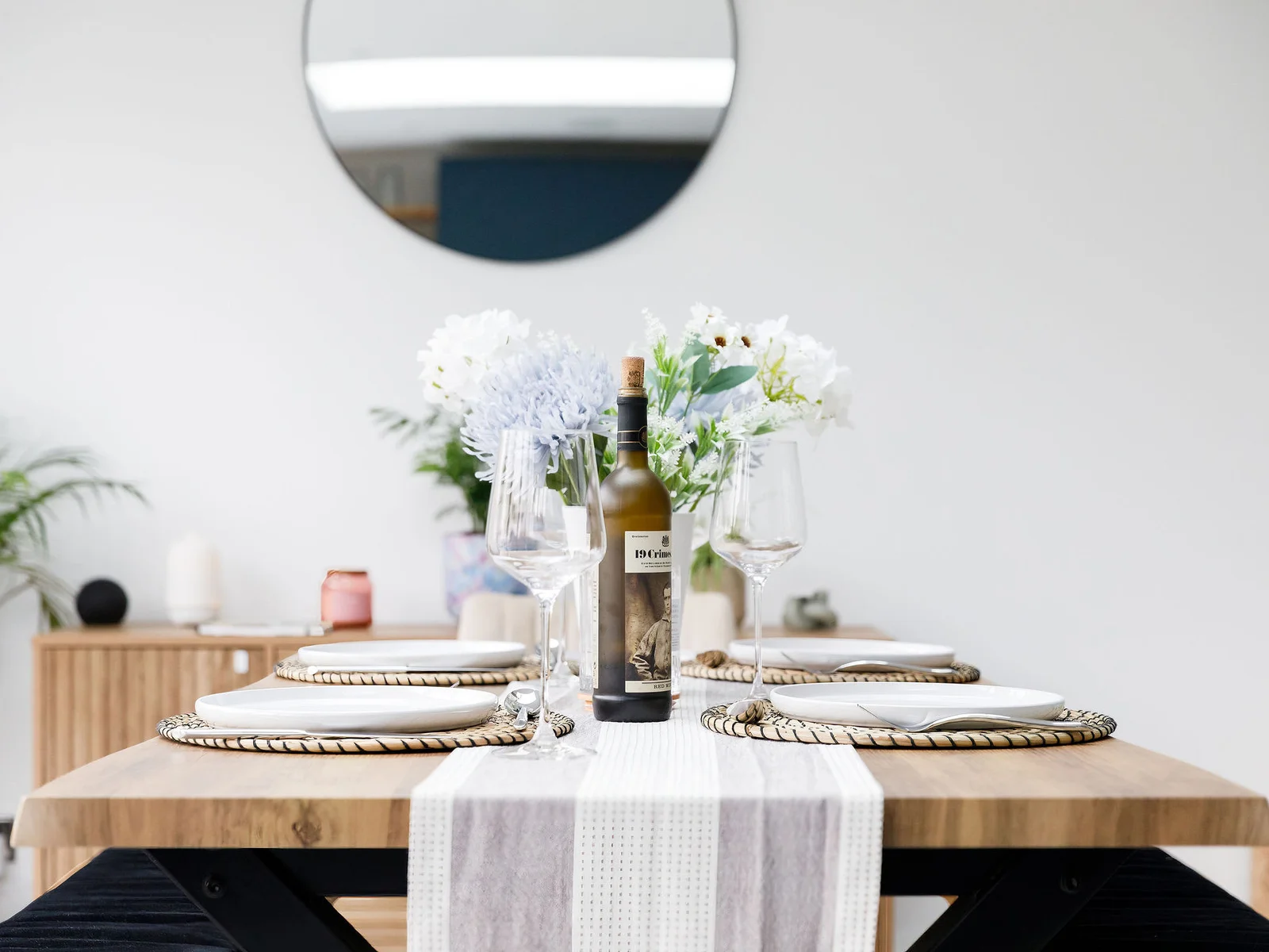 For more formal dining, there is a dining table and bench seating to seat up to 8 guests.