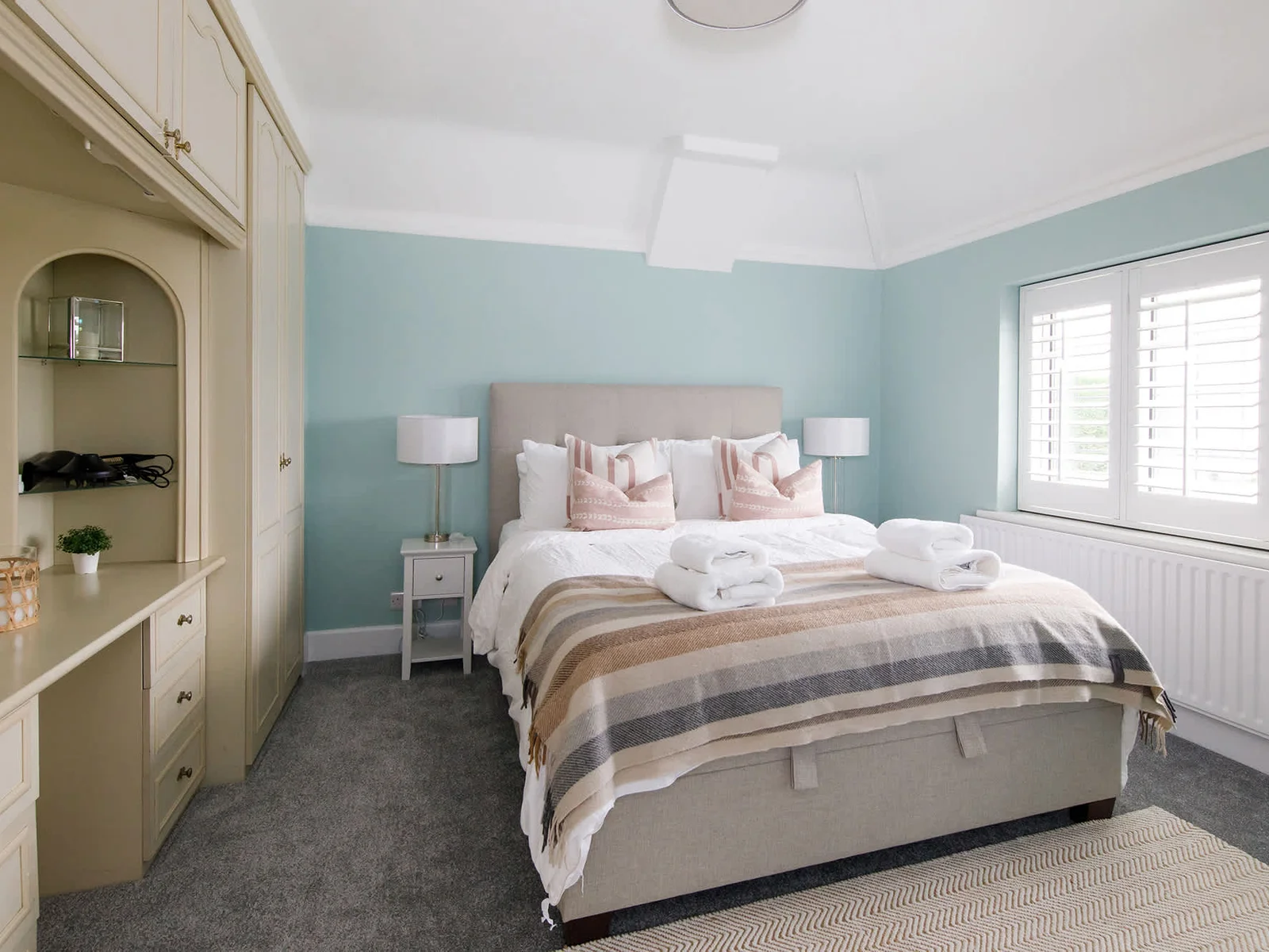 The master room has in-built wardrobes with a vanity area. Perfect for storing all your belongings and getting ready in the morning.