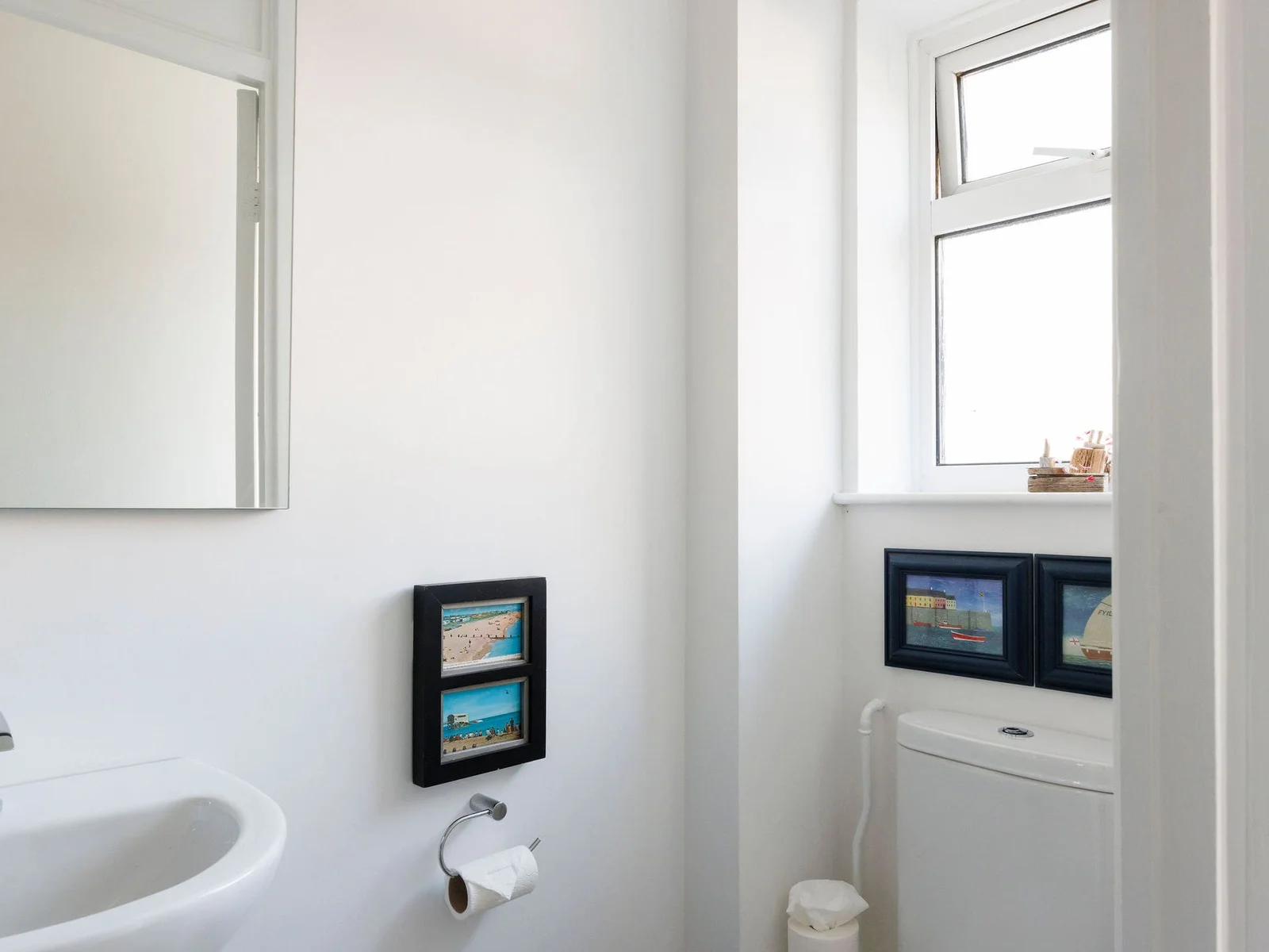 Charming guest bathroom with nautical accents