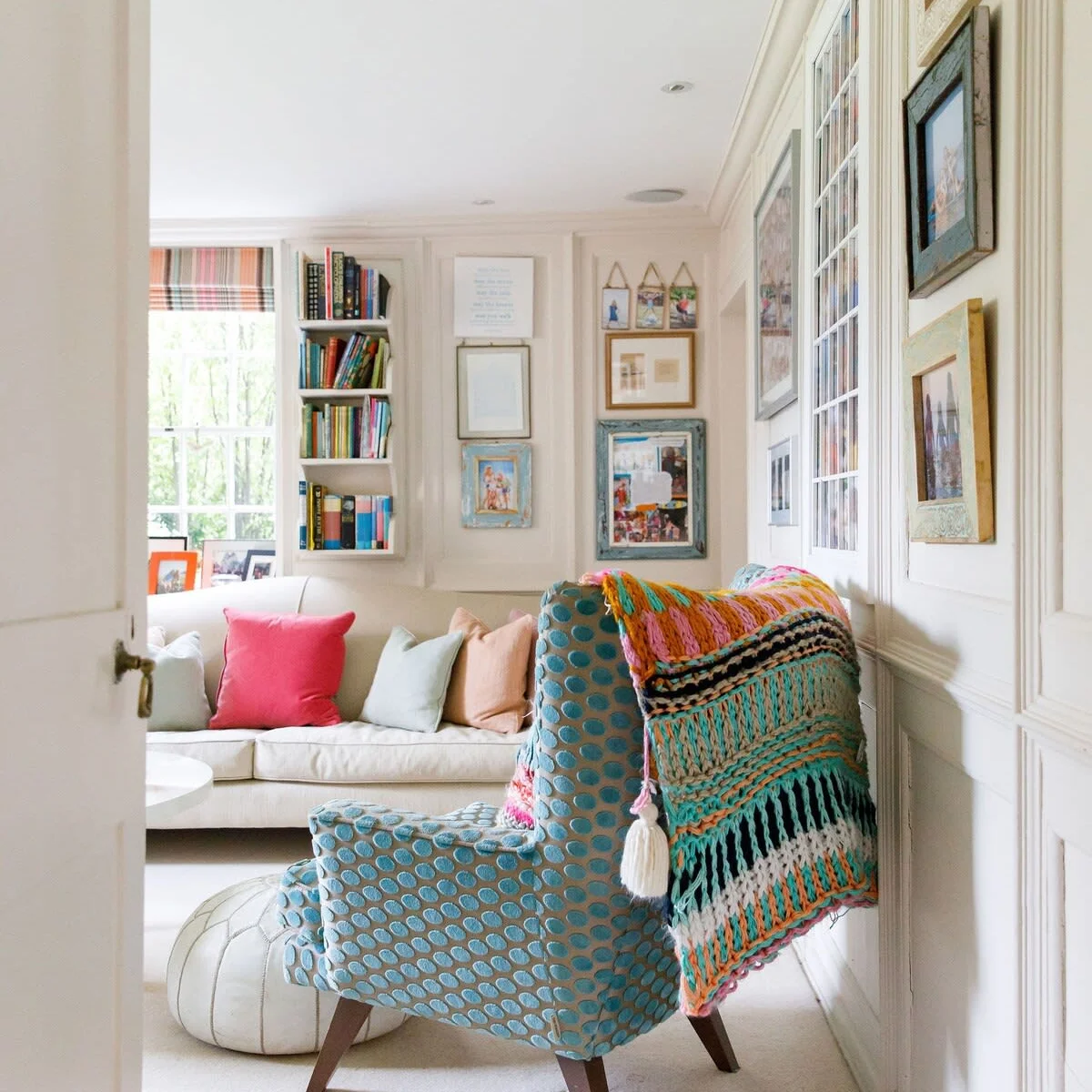 The drawing room is colourful and light, with cosy throws and comfy cushions.
