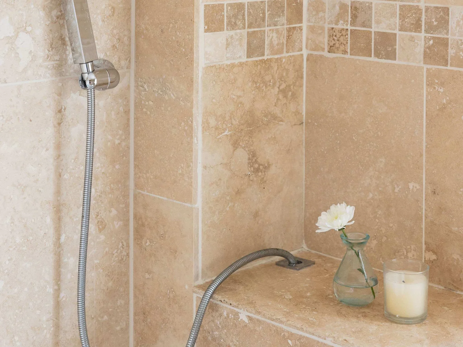 The bath also features a handheld shower, adding a little extra flexibility for getting ready each day.