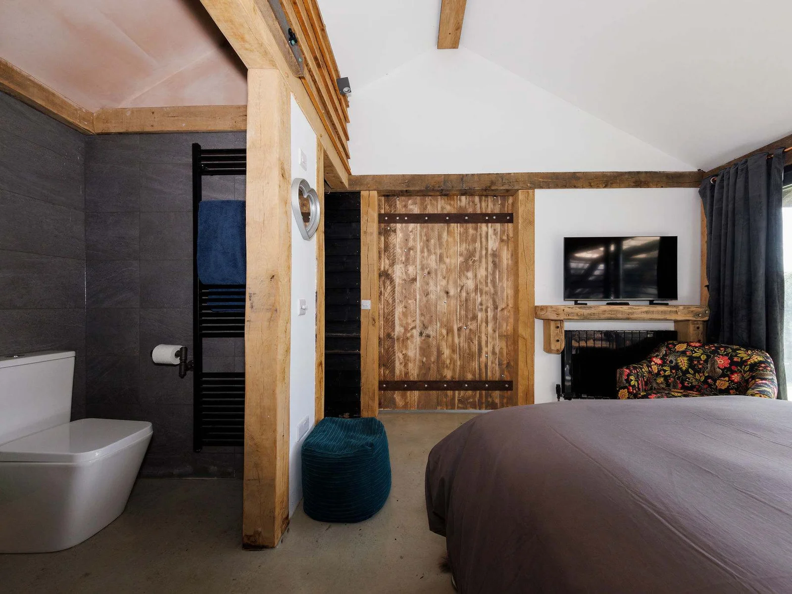 The en suite bathroom with pocket sliding doors for privacy.