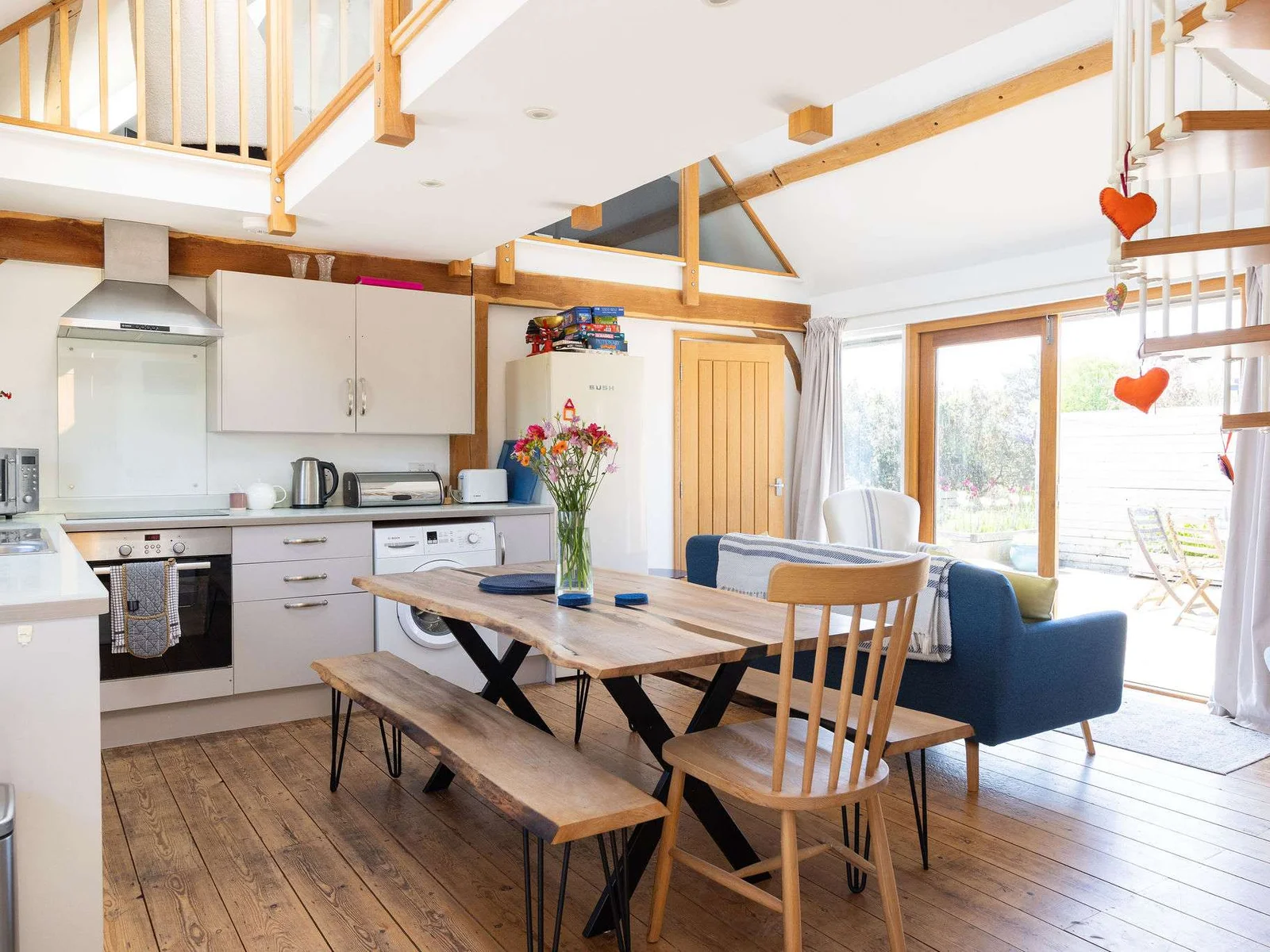 Enjoy cooking and dining together in this inviting barn conversion, offering both style and comfort.