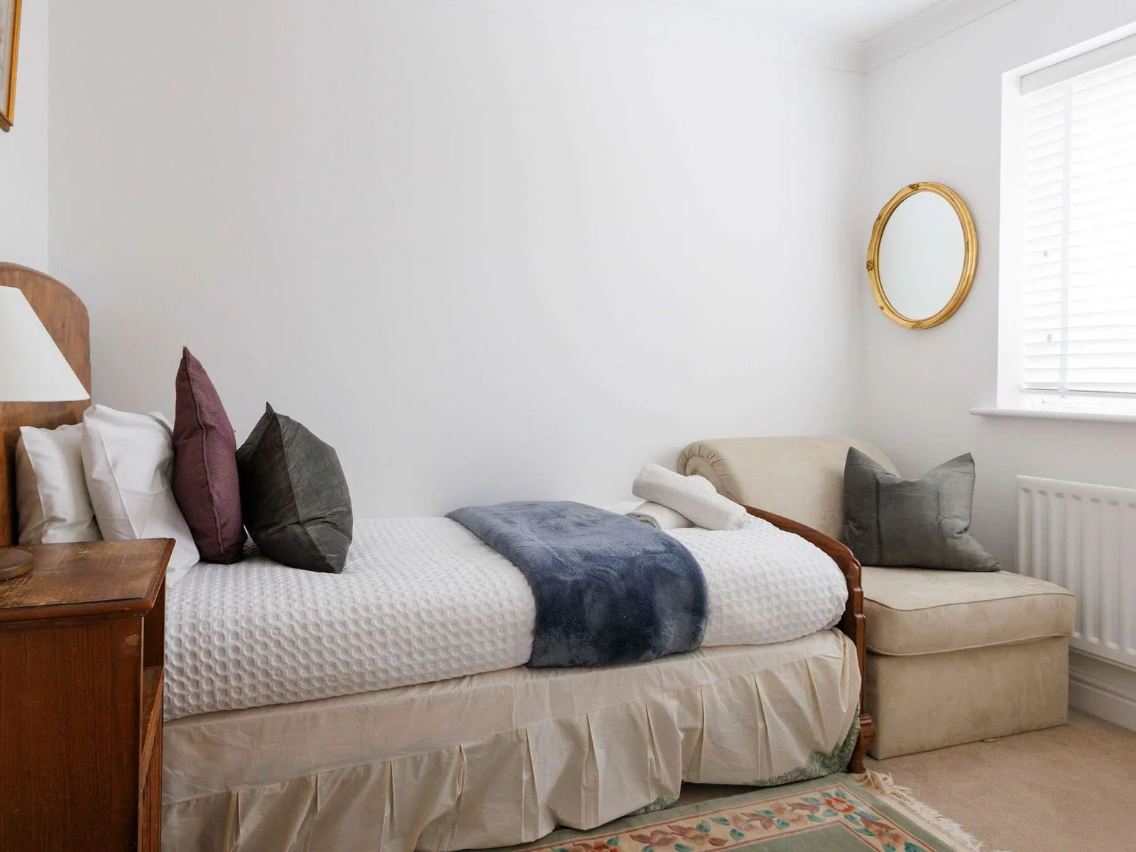 The small sofa bed in the fourth bedroom