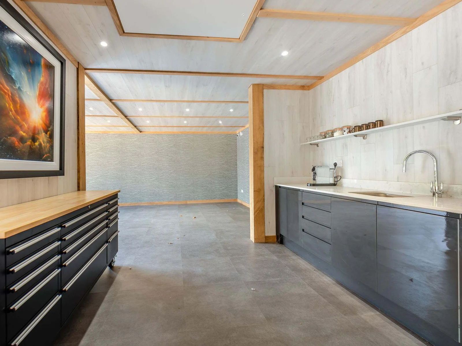 A handy kitchenette within the garage plus tool boxes