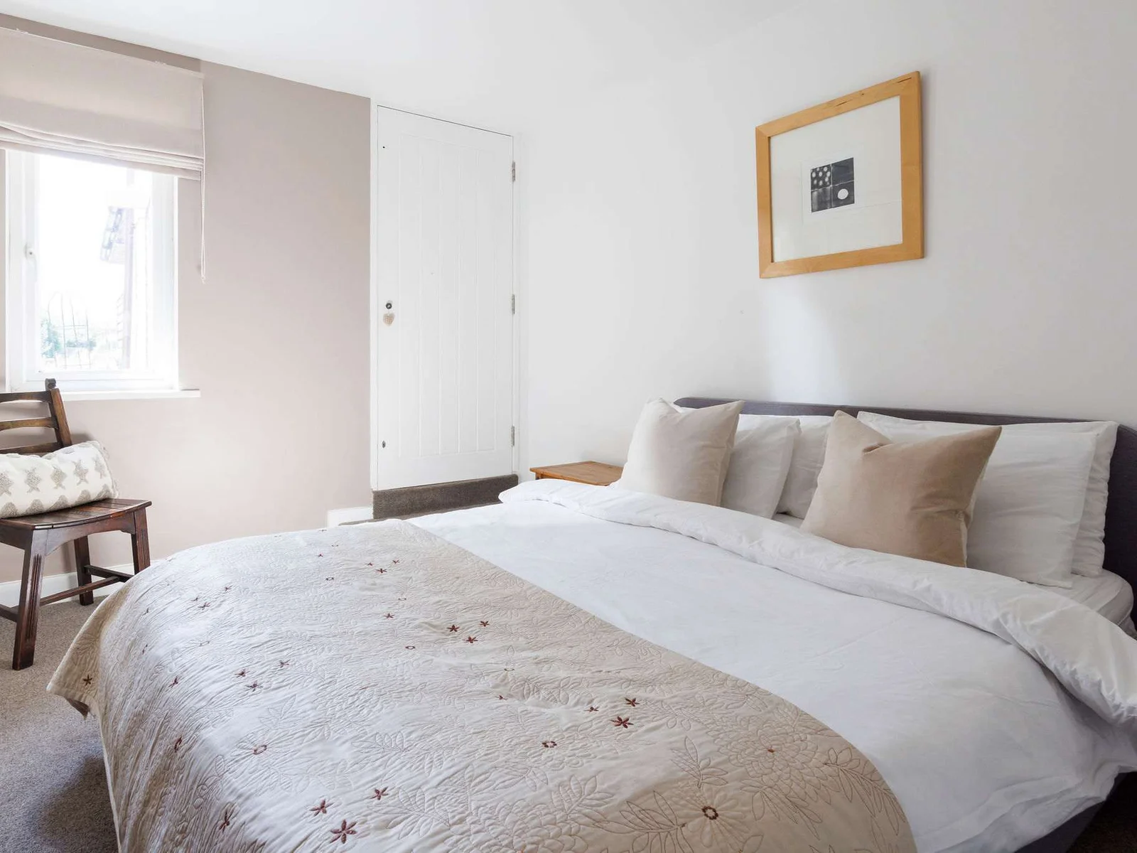The downstairs double has quality bedding and linen, and is decorated in soft, neutral tones.
