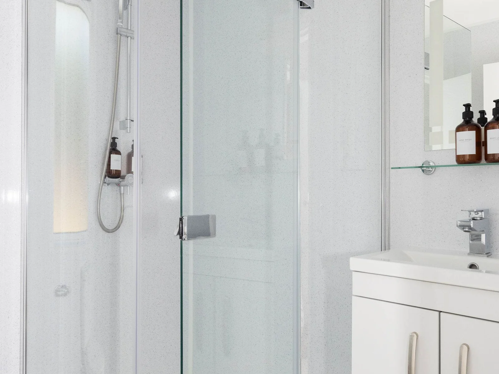 Bright en suite with walk-in shower and toilet