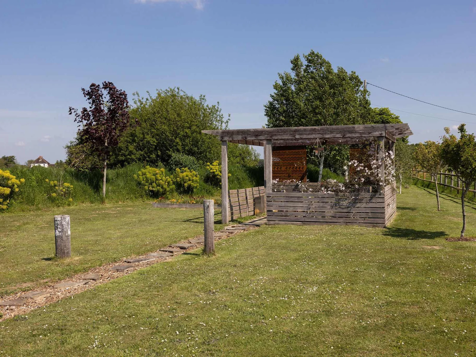 This property boasts a truly serene outdoor space, perfect for relaxation and reconnecting with nature.