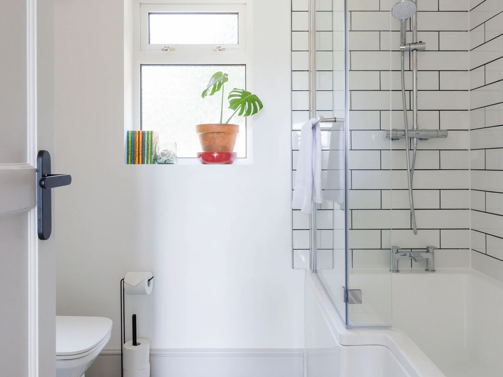 Freshen up in our stylish bathroom featuring modern fixtures and a serene atmosphere