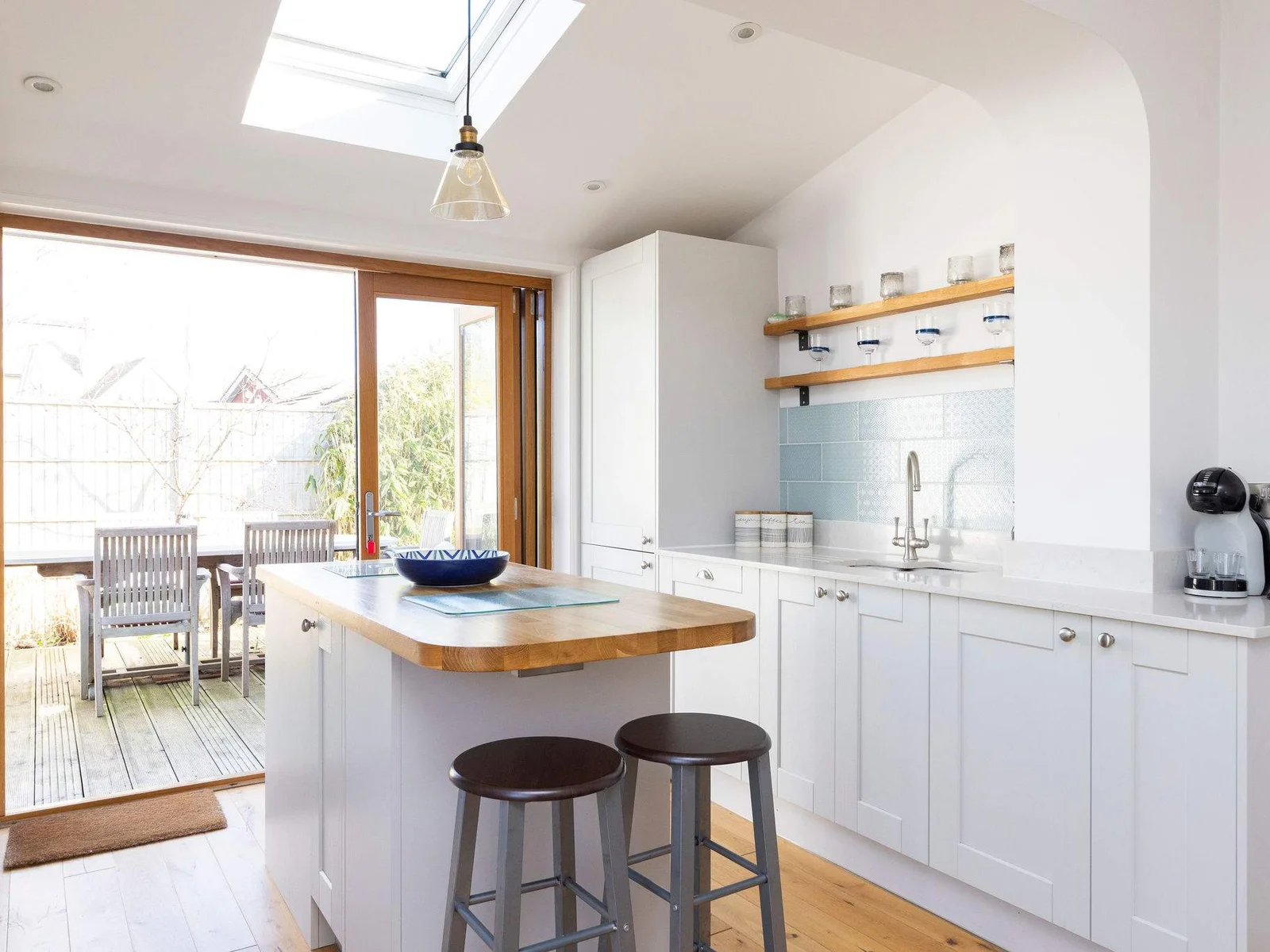 Our modern kitchen offers a great space for cooking and casual dining, with direct access to the outdoor patio.