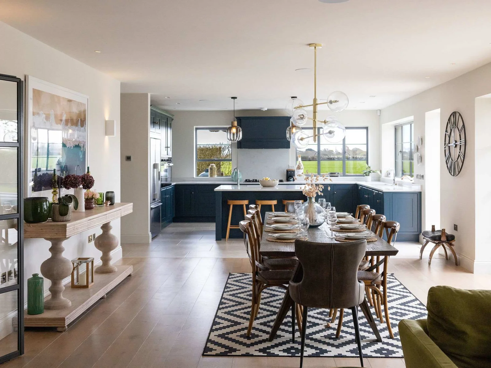 Gather in the spacious open-plan kitchen and dining area, designed for sociable entertaining.